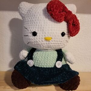 Plush Toy with Red Bow and Blue Outfit